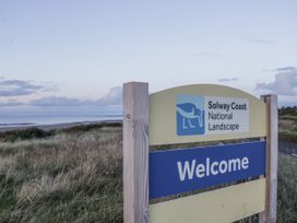 A welcome sign for Solway Coast National Landscape