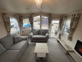 A living room with a sofa and coffee table at Caravan 941 Clacton-On-Sea