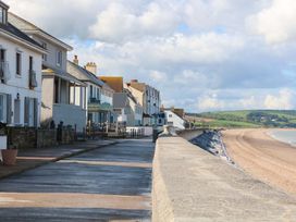 A row of houses along a beachfront at 3 Chantry Hill in Kingsbridge