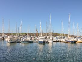 A marina with various boats docked at Tobys Quay in Falmouth