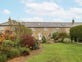 A house with garden and pathway at 3 Christon Bank Mews Alnwick