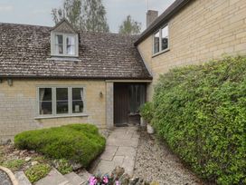 An outdoor entrance with a door and window at St. Marys House Church Westcote near Bledington