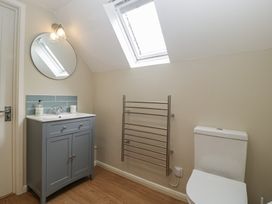 A bathroom with a sink and mirror at St. Marys House in Church Westcote near Bledington