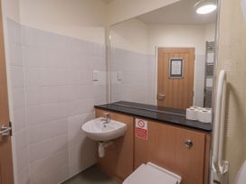 A bathroom with a sink and toilet at Eamont Park First-floor Double Bedroom in Penrith