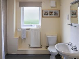 A bathroom with a sink and toilet at Bungalow 14 Eamont Park Penrith