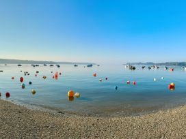 A view of water with buoys and boats at The Studio Feock near Truro