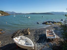 A view of boats at the shoreline in Porthmadog