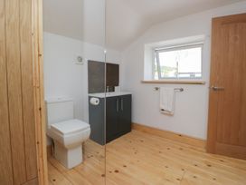 A bathroom with a sink and toilet at Old Post Office Cottage in Ulverston