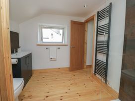 A bathroom with a sink and toilet at Old Post Office Cottage in Ulverston