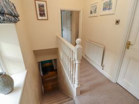 A staircase and hallway at Deer How Farm in Patterdale near Glenridding