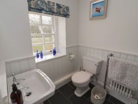 A bathroom with a sink and toilet at Deer How Farm in Patterdale near Glenridding