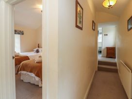 A hallway leading to a bedroom at Deer How Farm in Patterdale near Glenridding