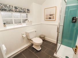 A bathroom with a shower and toilet at Deer How Farm Patterdale near Glenridding