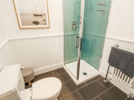 A bathroom with a shower and toilet at Deer How Farm in Patterdale near Glenridding