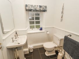 A bathroom with a sink and toilet at Deer How Farm in Patterdale near Glenridding