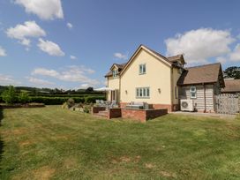 A house with a garden and patio at Filly Brook in Bishop's Frome