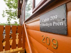A cabin sign at Y Bwthyn Pren, Cabin 209, Trawsfynydd