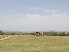 A house in a field with a path at Twilight in Raglan