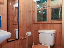 A bathroom with a sink and a toilet at The Boat House in Ashprington