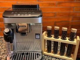 A coffee machine with glass tubes of coffee beans at Craster House in Seahouses