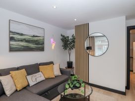 A living room with a sofa and coffee table at Milana in Tiverton