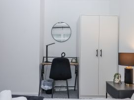 An office with a desk and chair at Milana in Tiverton