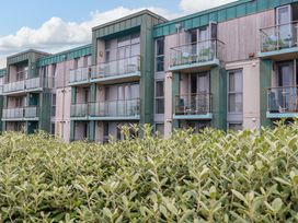 A view of buildings with balconies and plants at Penthouse @46Zinc - Headland View, Newquay