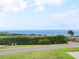 A view of the sea and horizon from a garden at St Marys in Penzance