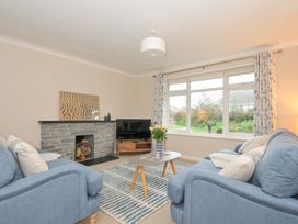 A living room with sofas and a coffee table at 42 Little Trelyn in Rock