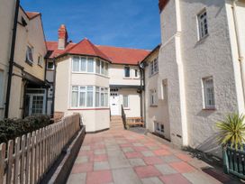 An outdoor area with a pathway and several buildings at Iveridge Sandsend