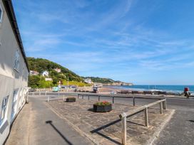 A beach with benches and planters at Iveridge in Sandsend