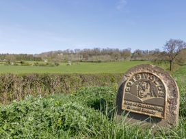 A sign indicating the Cotswolds Area of Outstanding Natural Beauty
