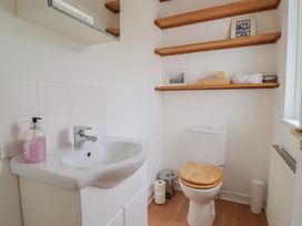 A bathroom with a sink and toilet at 20 Lym Close Lyme Regis