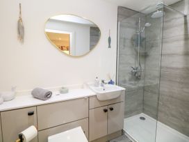 A bathroom with a sink and shower at Stoney Rock Lodge