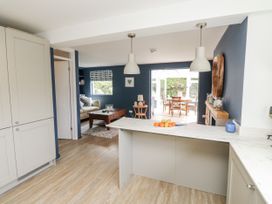 A kitchen featuring cabinets and an island countertop at 1 Island View Thurlestone