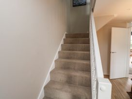 A staircase in a hallway at 1 Island View Thurlestone