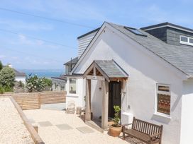 An outdoor area with a house entrance at Clova in Brixham