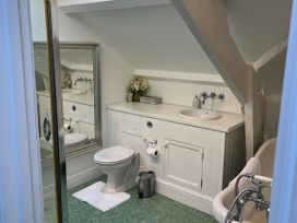 A bathroom with a sink and toilet at Trenare in Truro