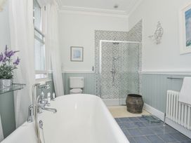 A bathroom with a bathtub and shower at Trenare in Truro