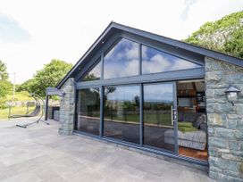 An outdoor area with a view at Perth Y Deri in Llanddwywe