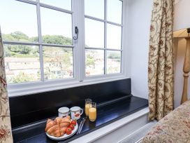 A kitchen window sill with breakfast items at Rigg Cottage in Sandsend