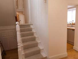 A hallway with stairs leading to upper floor at 11 Ballygate Babbacombe