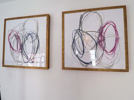 Framed abstract artwork on a wall at 11 Ballygate Babbacombe