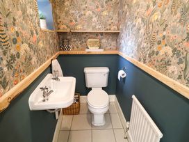 A bathroom with a sink and toilet at 11 Ballygate in Babbacombe
