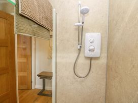 A shower with water control unit and table at No 157 Sandown Bay Holiday Chalet 'Field View' Sandown