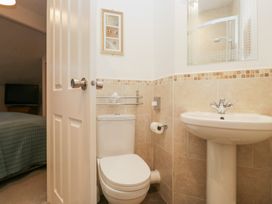 A bathroom with a sink and toilet at Norwood House in Ambleside