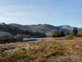 A landscape view featuring hills and a river at Norwood House Ambleside