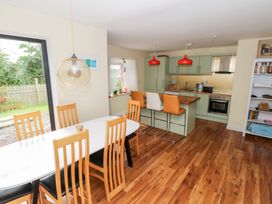 A kitchen with dining area featuring table and chairs at Huath in Carrick on Shannon