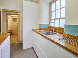 A kitchen with a sink and countertop at Beachside Cottage Sandsend
