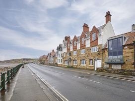A hotel by the road at Beachside Cottage in Sandsend